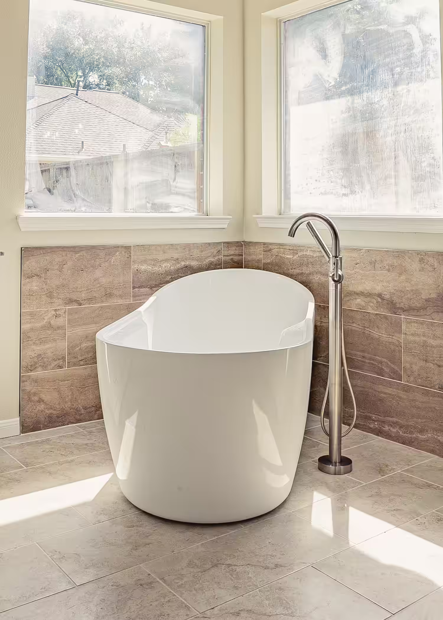 Delta fixtures in a calm, modern bathroom