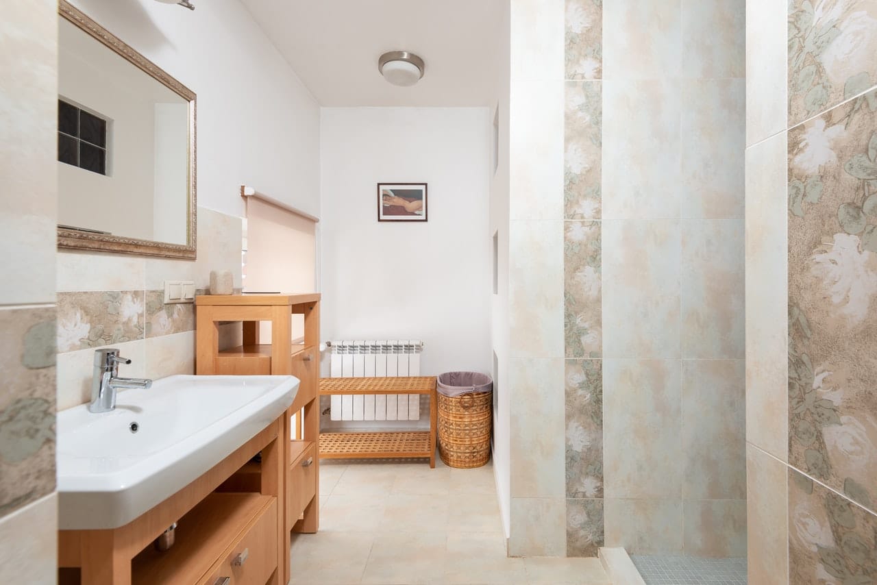 Minimalist Bathroom With Wooden Accents