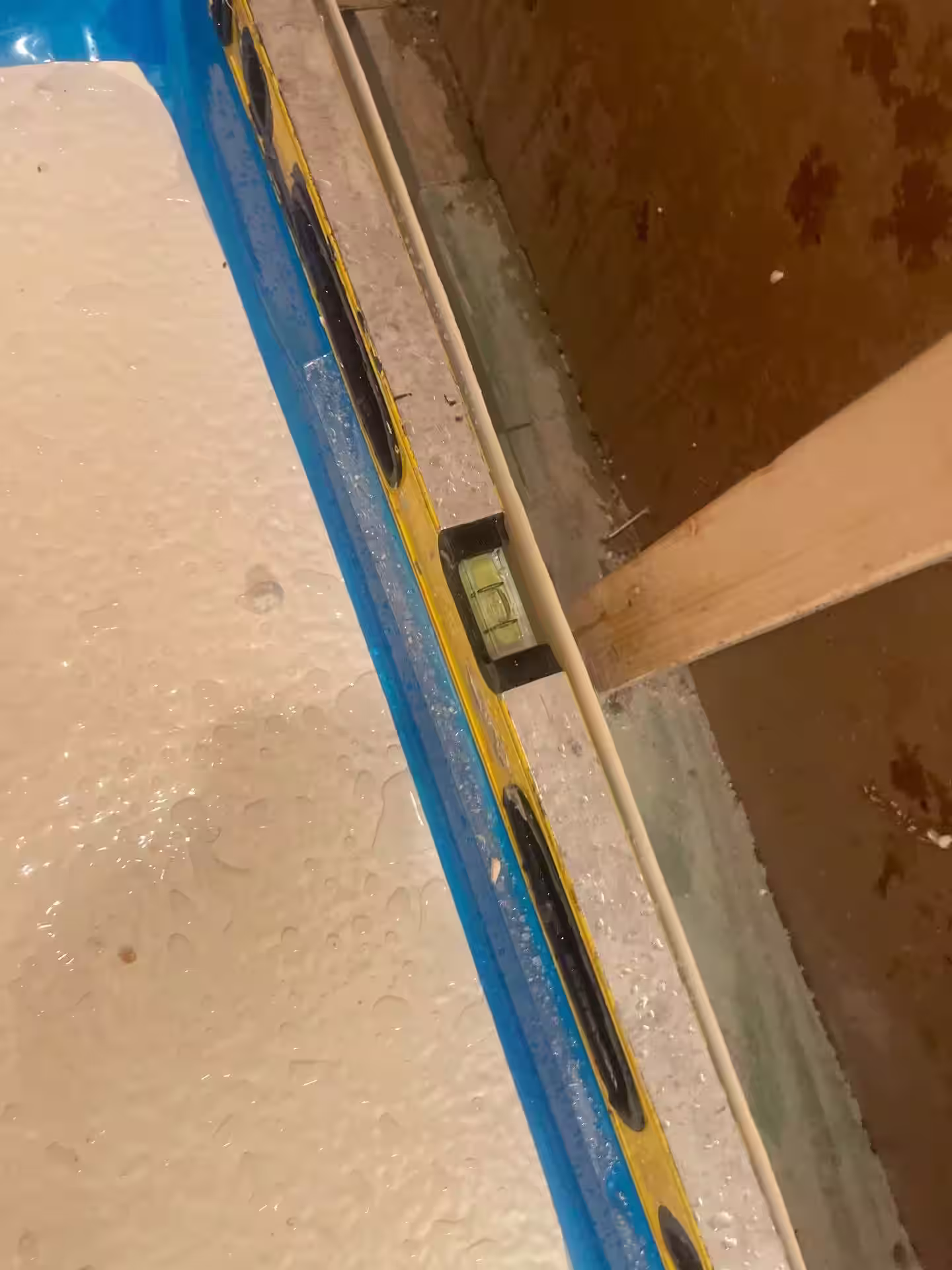 Shower pan installation during Houston bathroom remodel