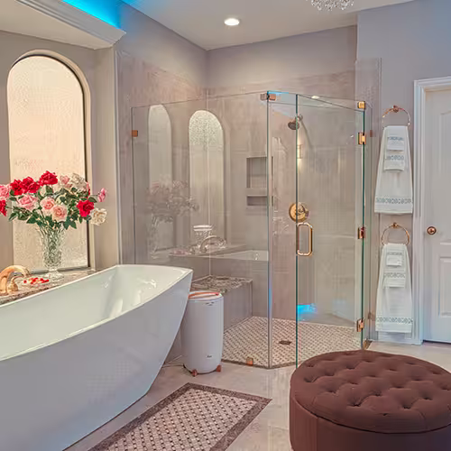 Luxury bathroom remodel with freestanding tub and glass shower