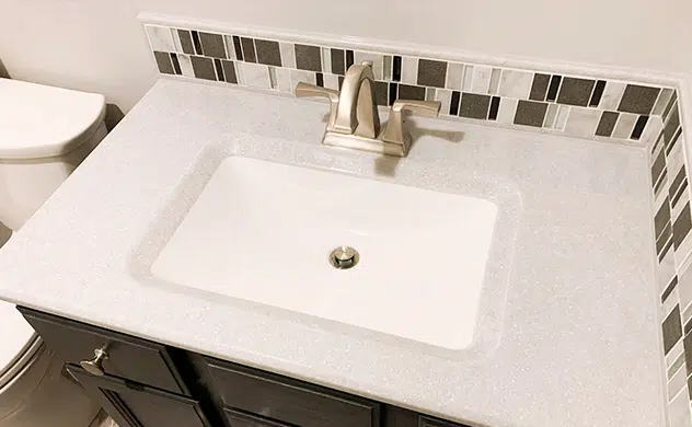 Modern bathroom sink with tile backsplash