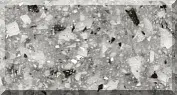 Gray terrazzo texture with scattered stone pieces